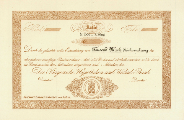 Altes Aktienzertifikat mit goldenem Rand und Porträt eines Mannes, wahrscheinlich eine Anleihe, mit gedrucktem Text.