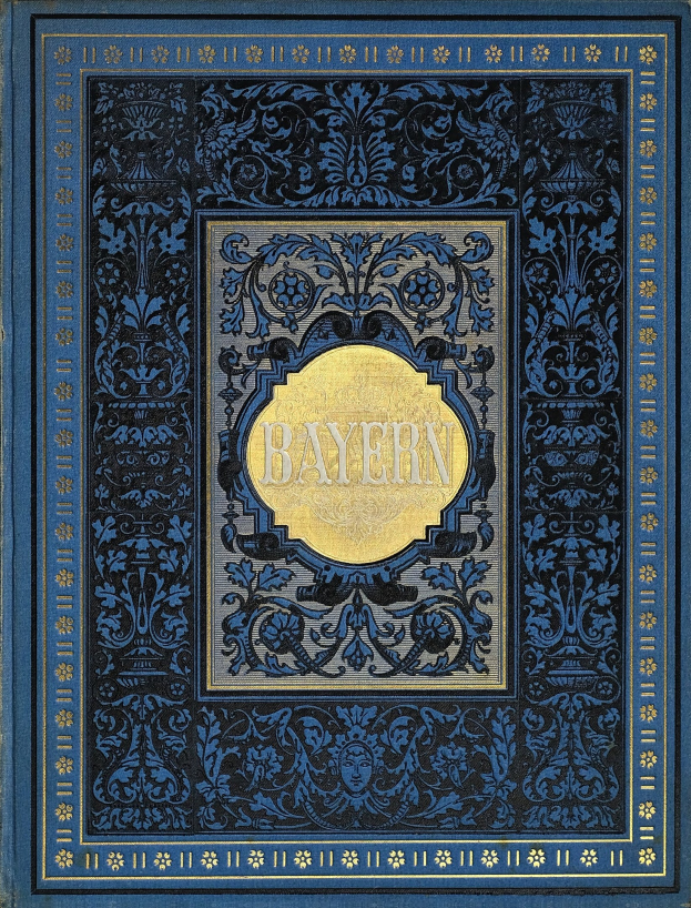 Ein blau-goldenes Buch mit dem Wort 'Bayern' darauf, das mit detaillierten Dekordesigns versehen ist.