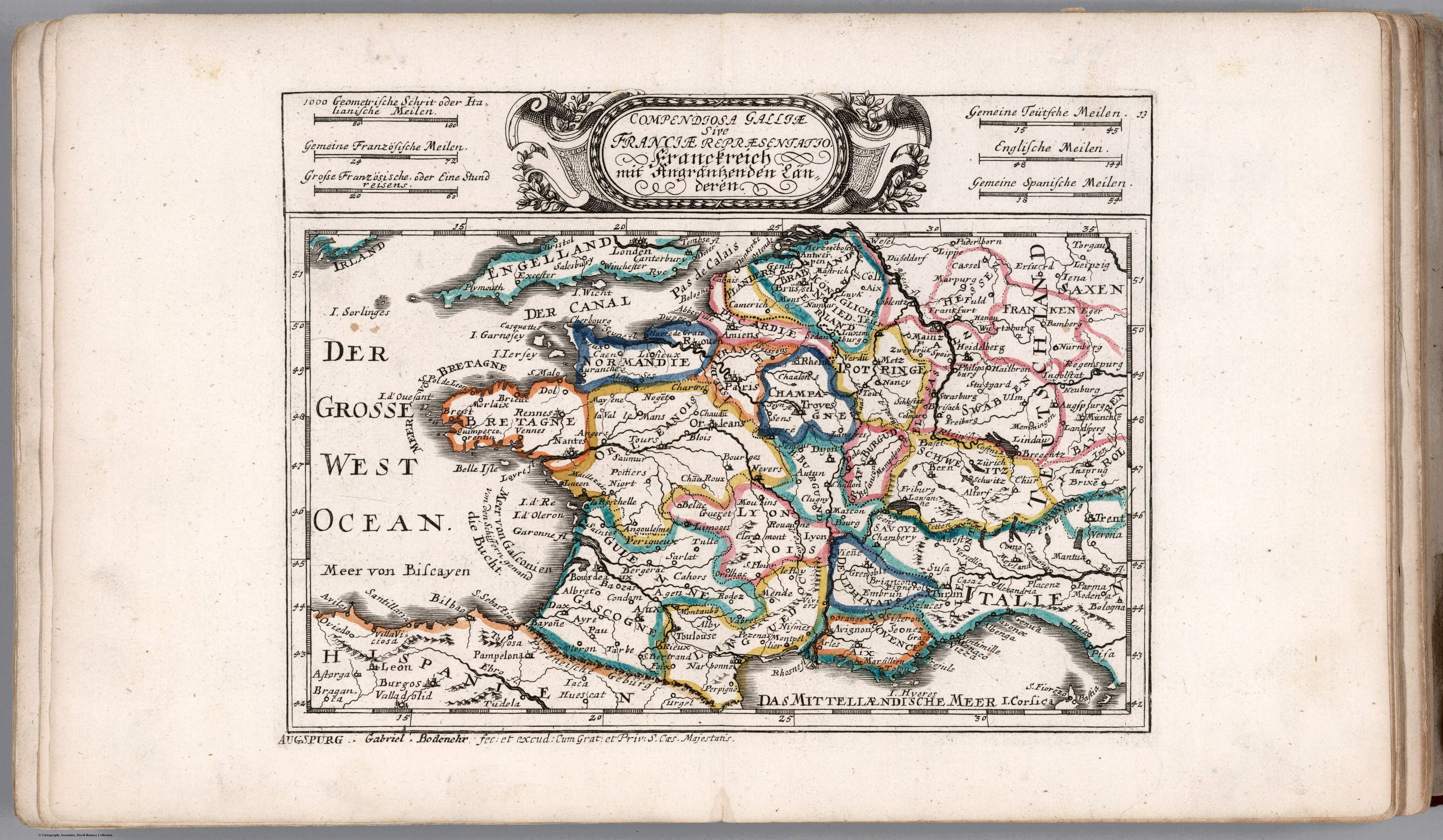 Ein aufgeschlagenes Buch mit einer detaillierten Deutschlandkarte, die von erklärendem Text begleitet wird.