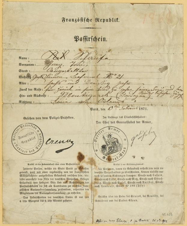 Gelblicher Brief des deutschen Regierungs mit einem kreisförmigen schwarzen Randstempel und schwarzer Tinte.